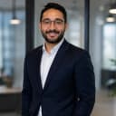 Yacine Meziane, startup entrepreneur smiling in office environment